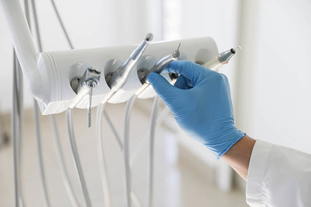 Professional Tooth Extraction technician working in New Orleans Station, LA